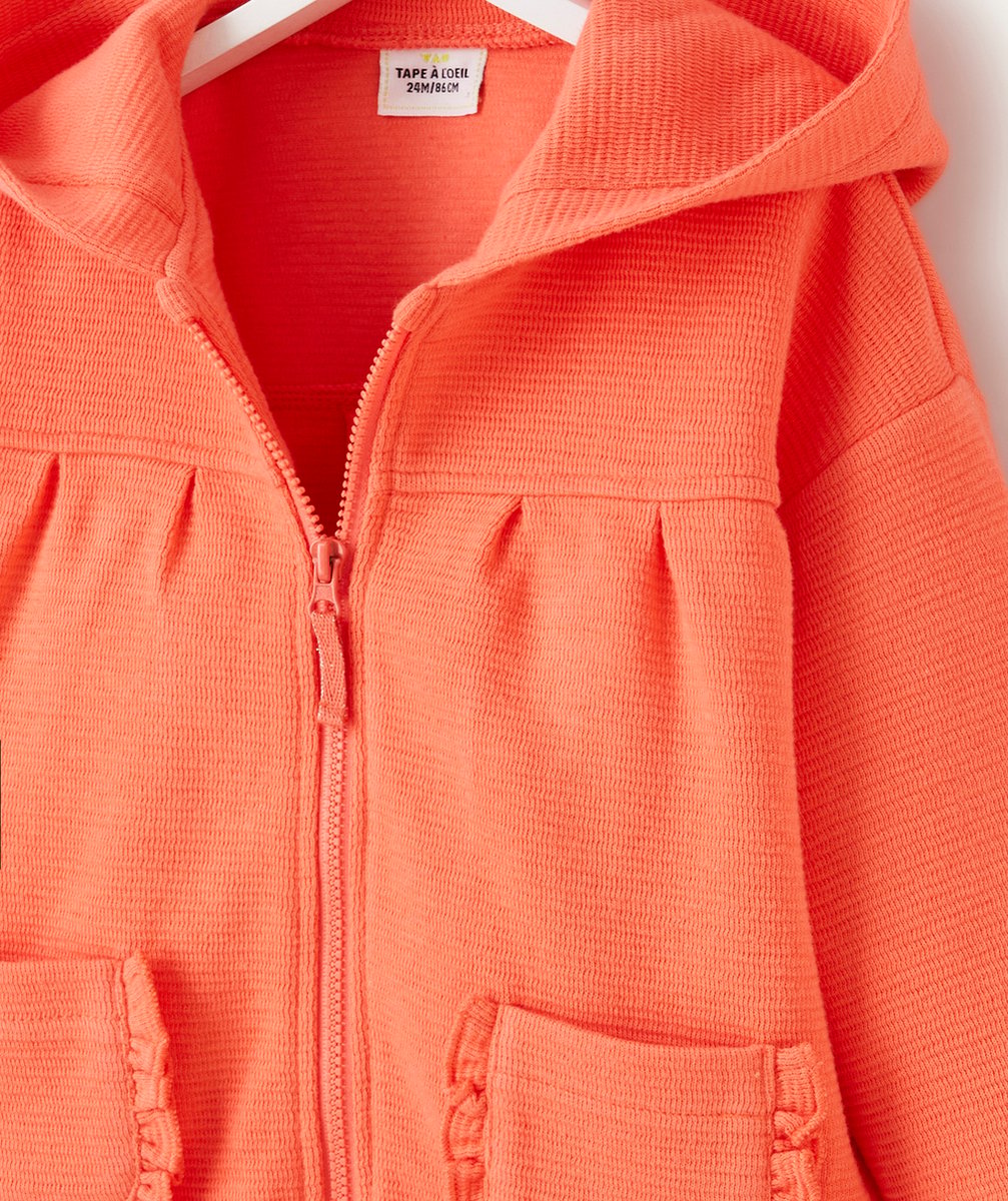 GILET À CAPUCHE BÉBÉ FILLE CORAIL AVEC POCHE À VOLANTS