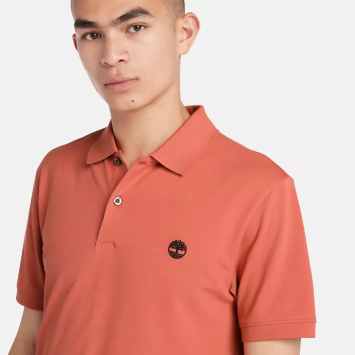Polo stretch Merrymeeting River pour homme en orange clair