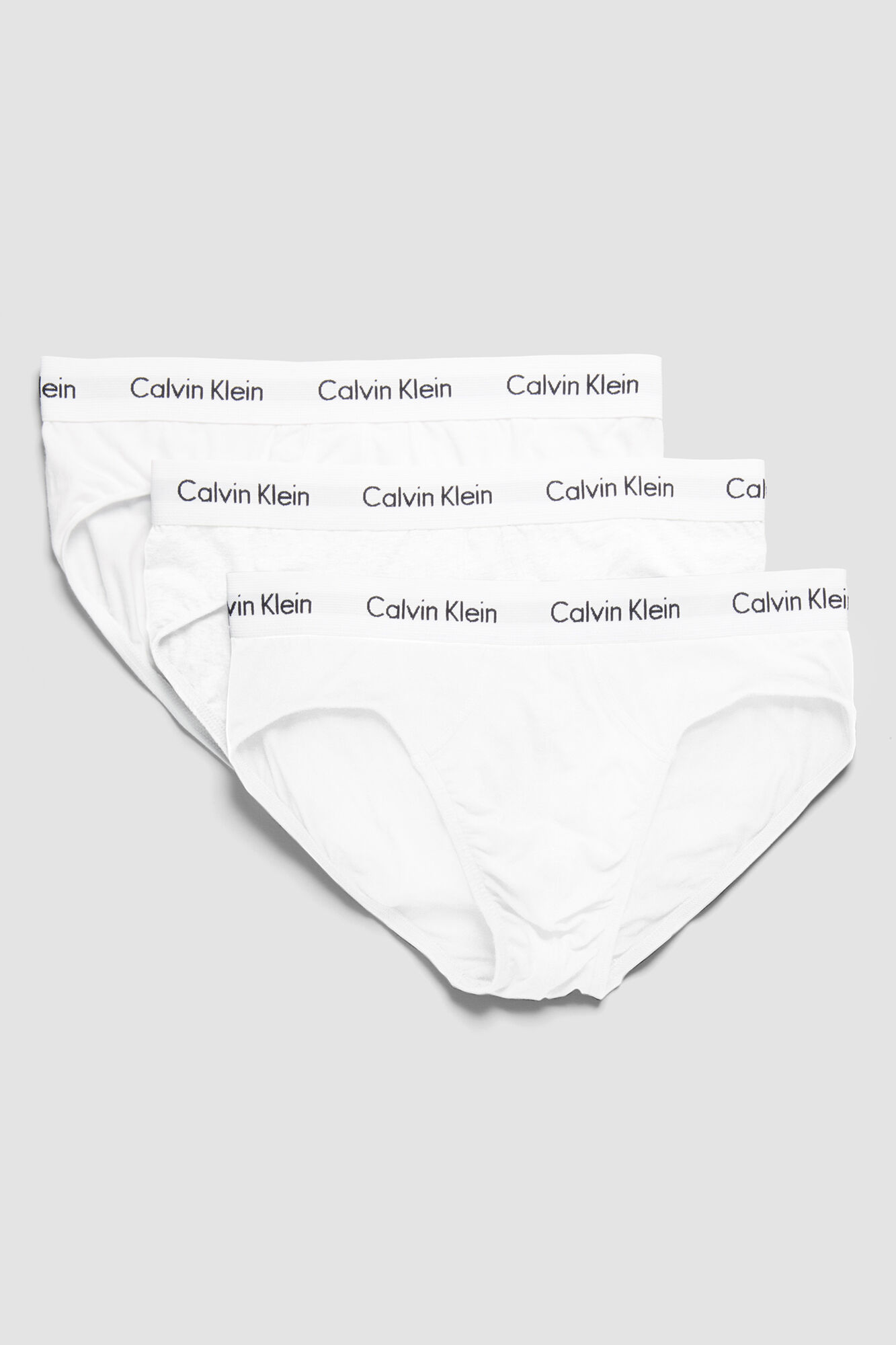Cuecas Calvin Klein de algodão, pacote com 3 unidades e cós elástico.