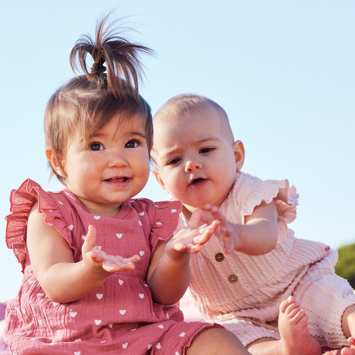 Topomini Newborn Overall mit Zopfmuster rosa
