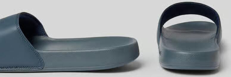 Lacoste Badslippers met logoprint model 'SERVE SLIDE'