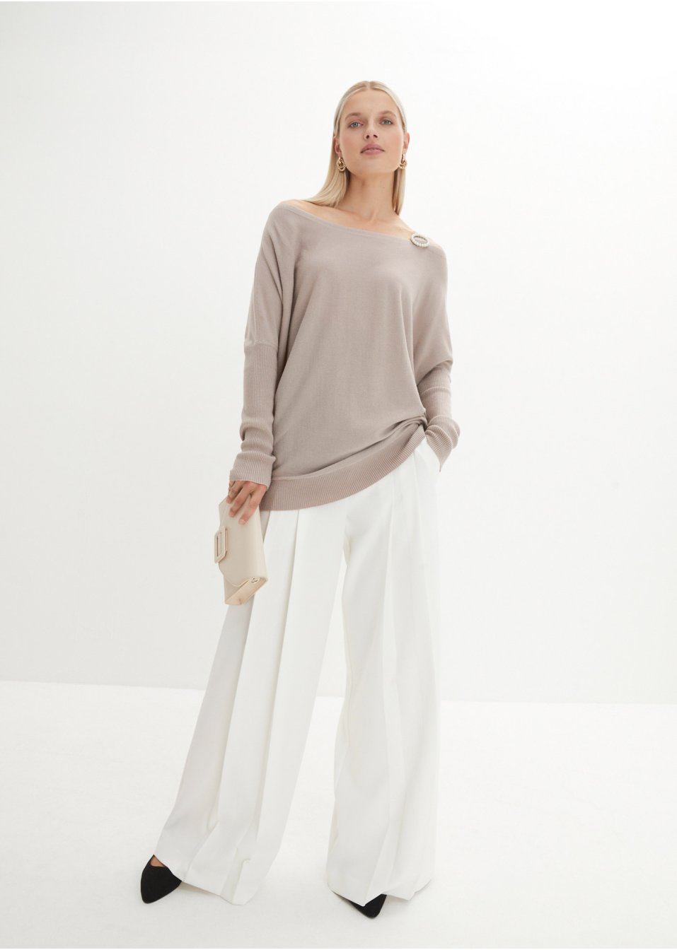 Pull avec élément décoratif