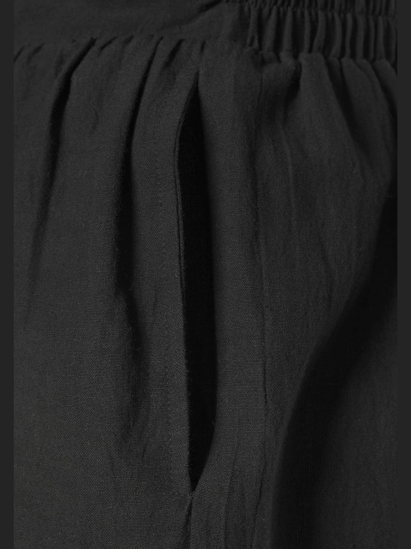 Shorts boutons décoratifs imitation bois devant