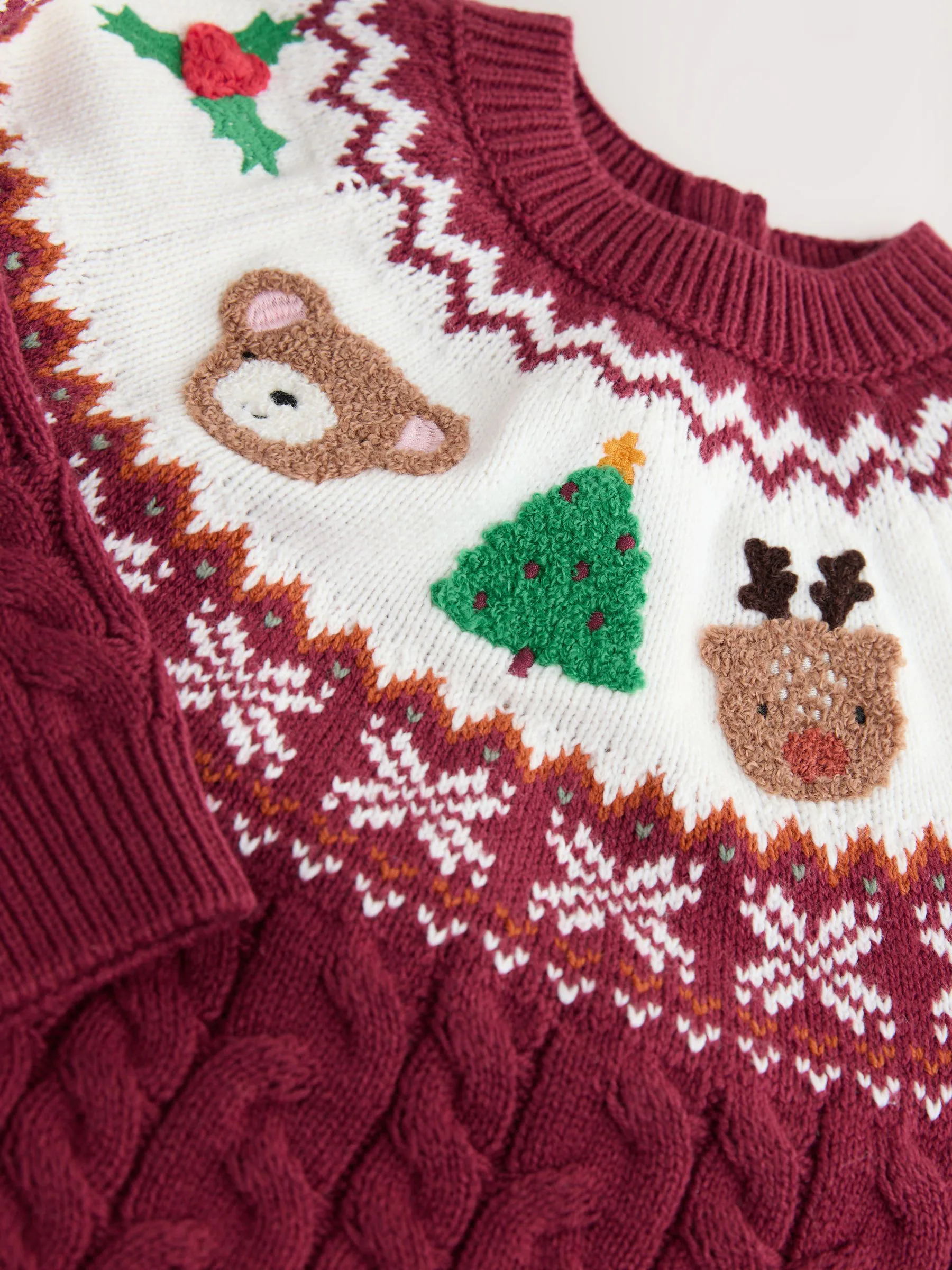 Paarsrood - Truijurk met kerstfiguren en fairisle-motief (3mnd -10jr)