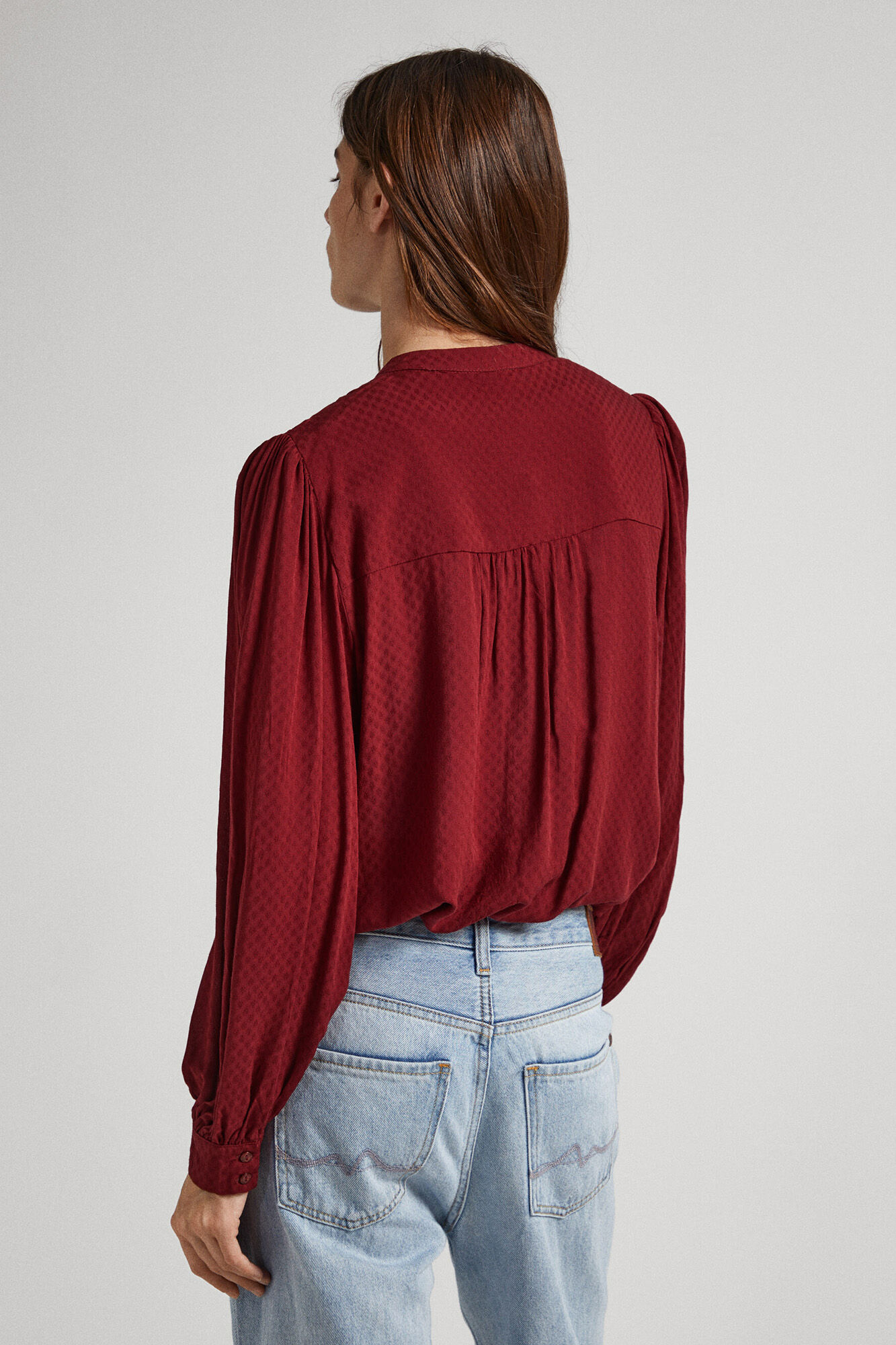 Blusa com detalhes plissados