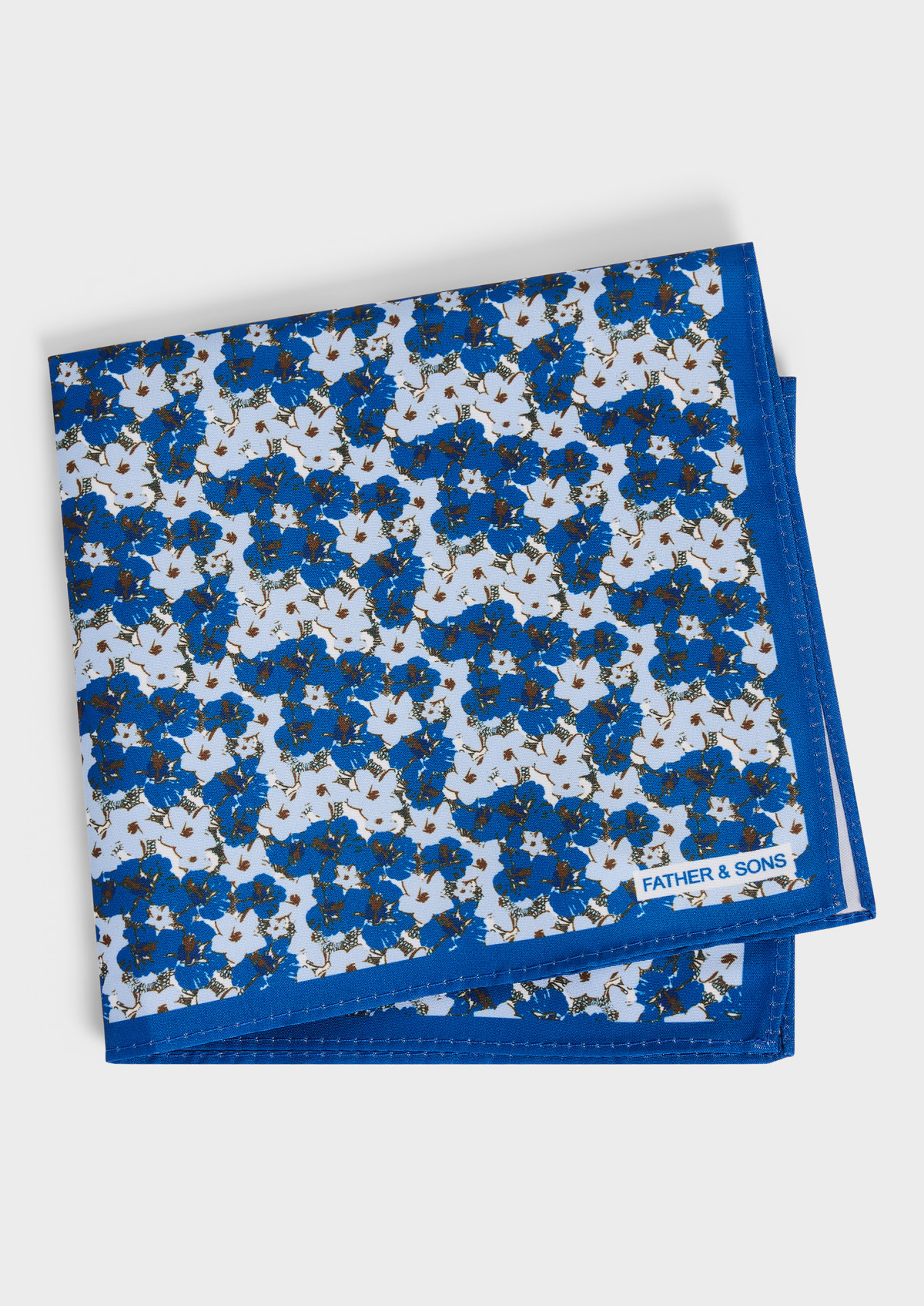 Pochette blanche à motif fleuri bleu cobalt et marron