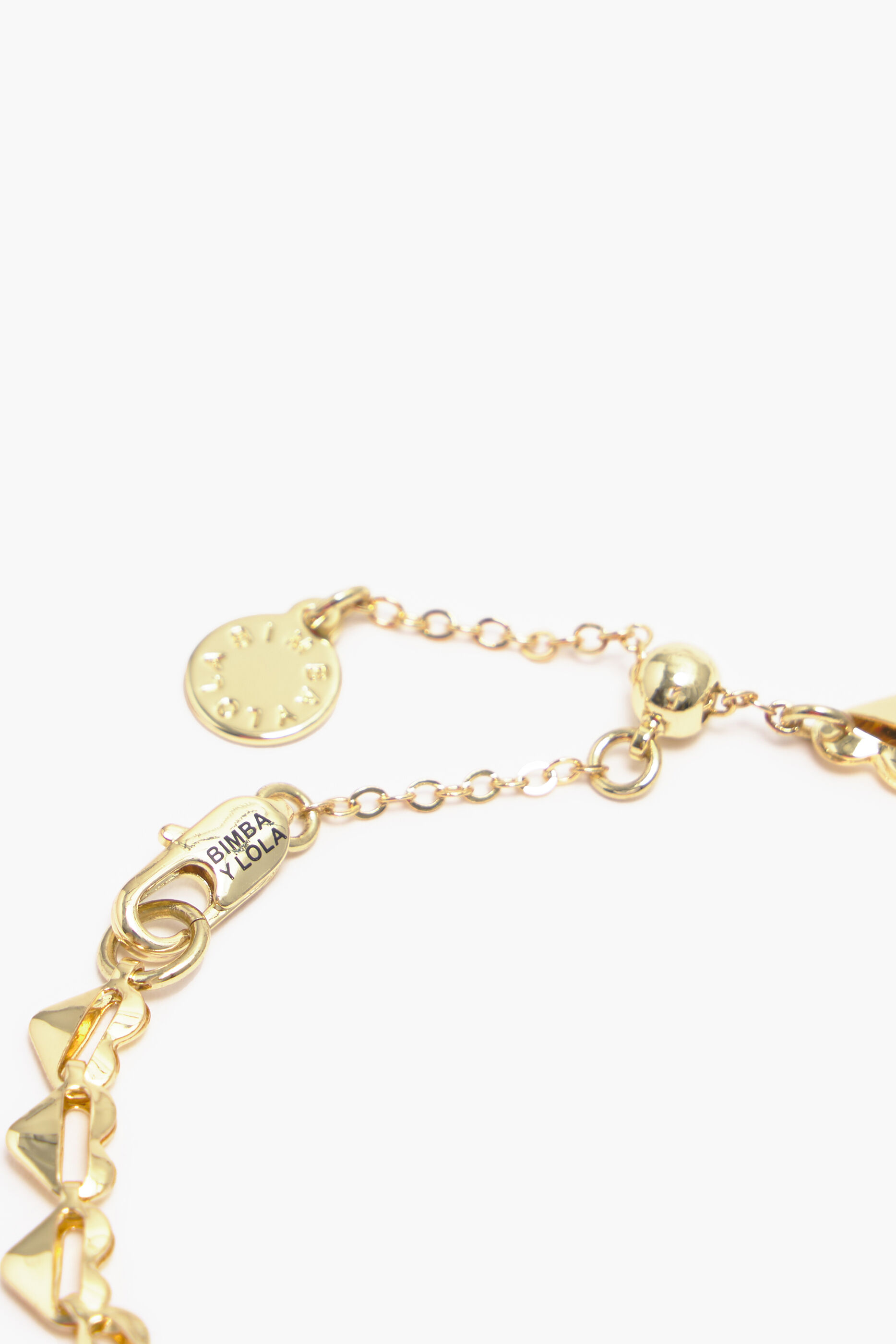 Pulseira de coração dourada