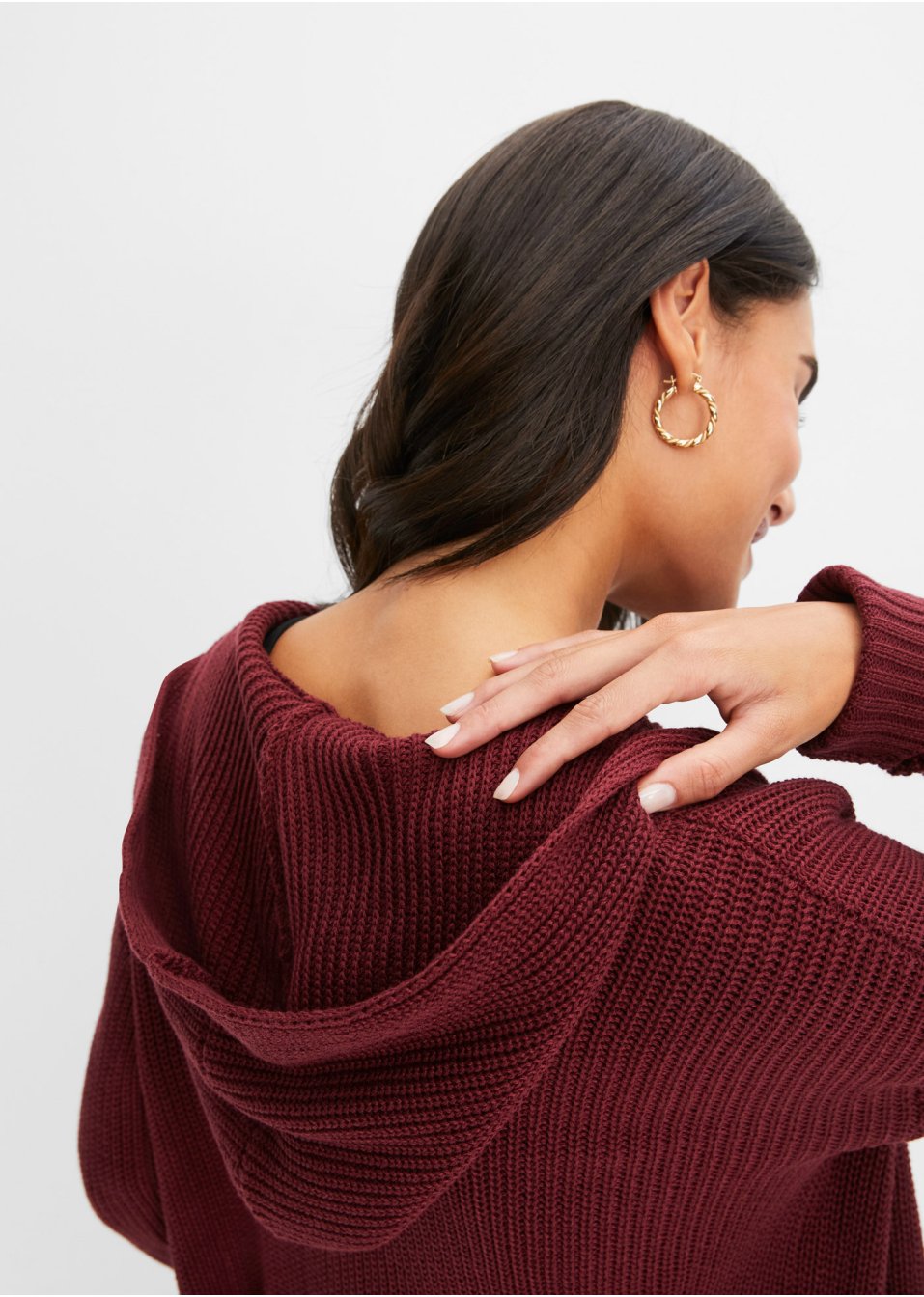 Gilet long en maille à capuche
