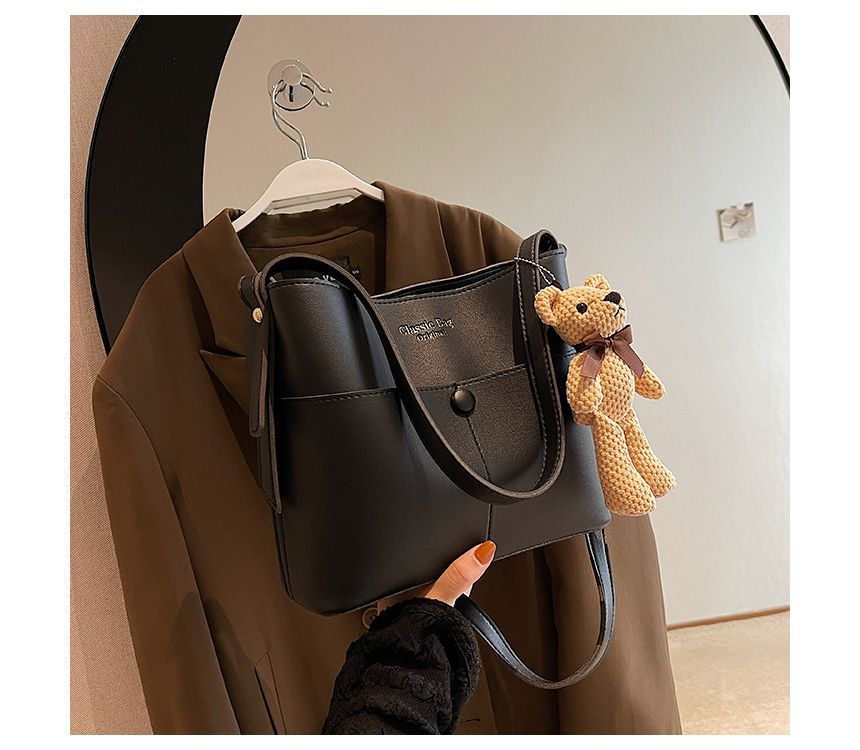 Skyglow - Kunstleren bucketbag met letters