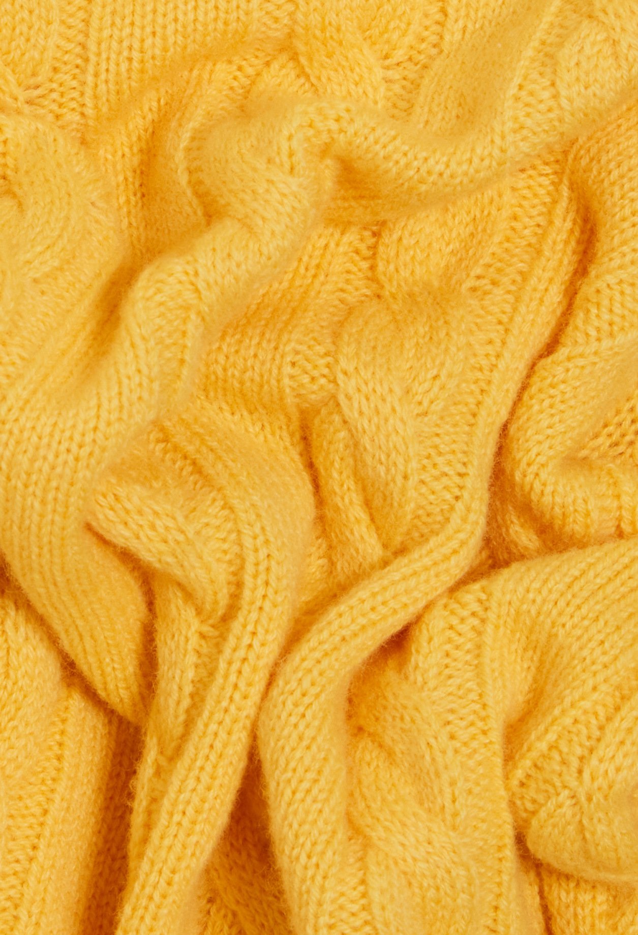 Pull court maille torsadee