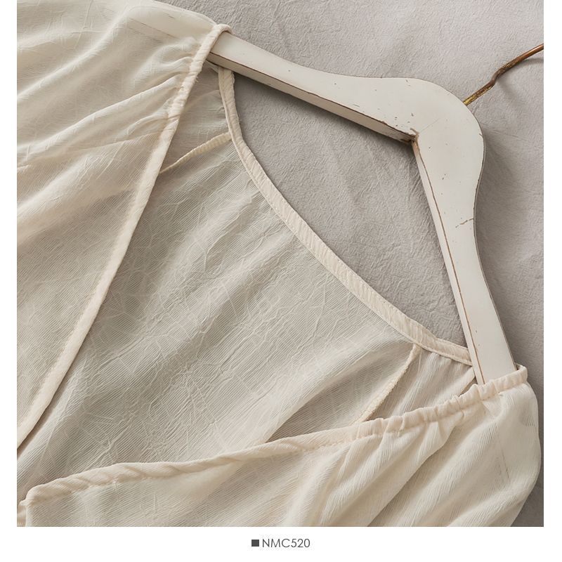 Lemongrass - Chiffon vest met strikceintuur en ballonmouwen