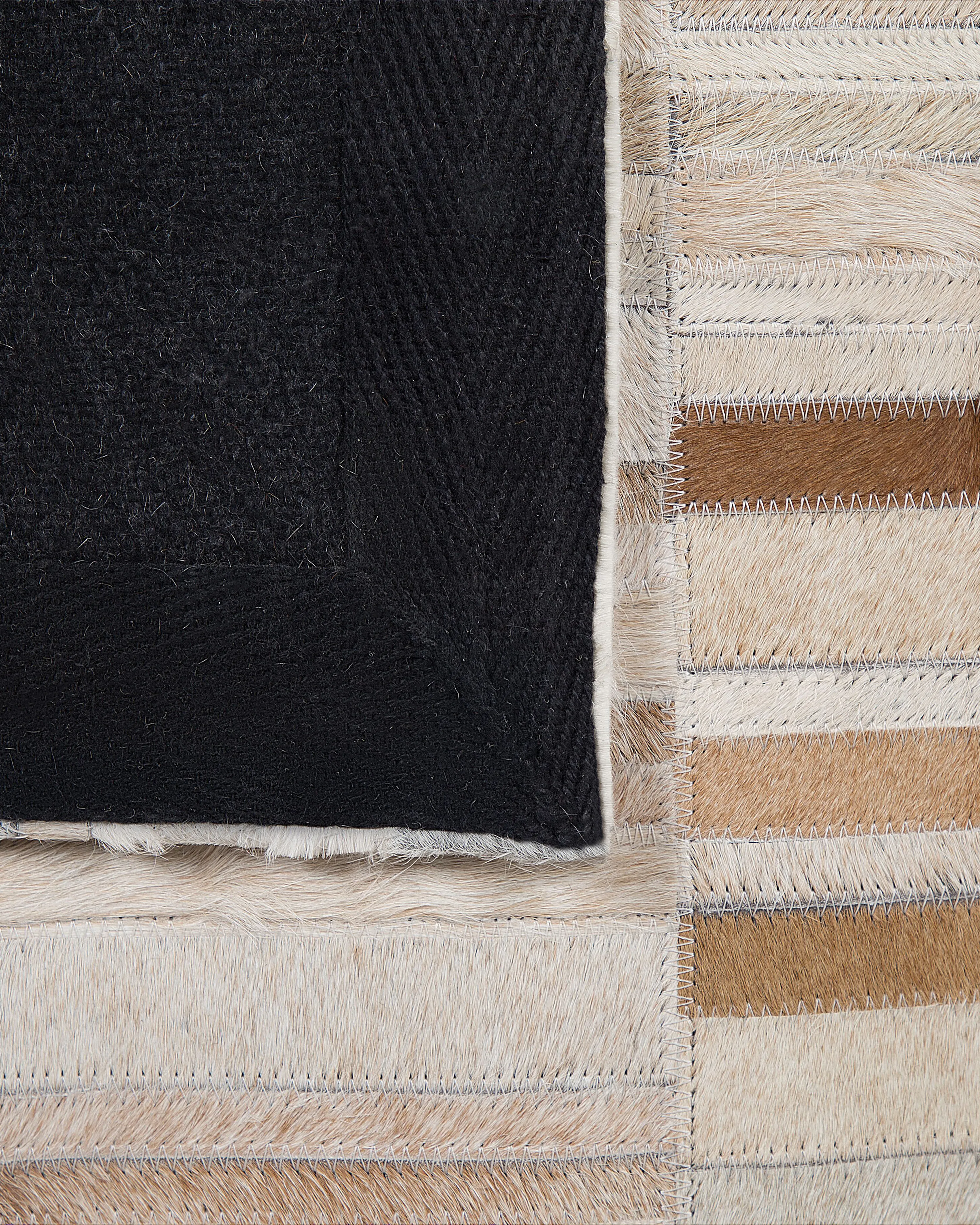 Vloerkleed YAGDA Beige 140 x 200 cm Leer