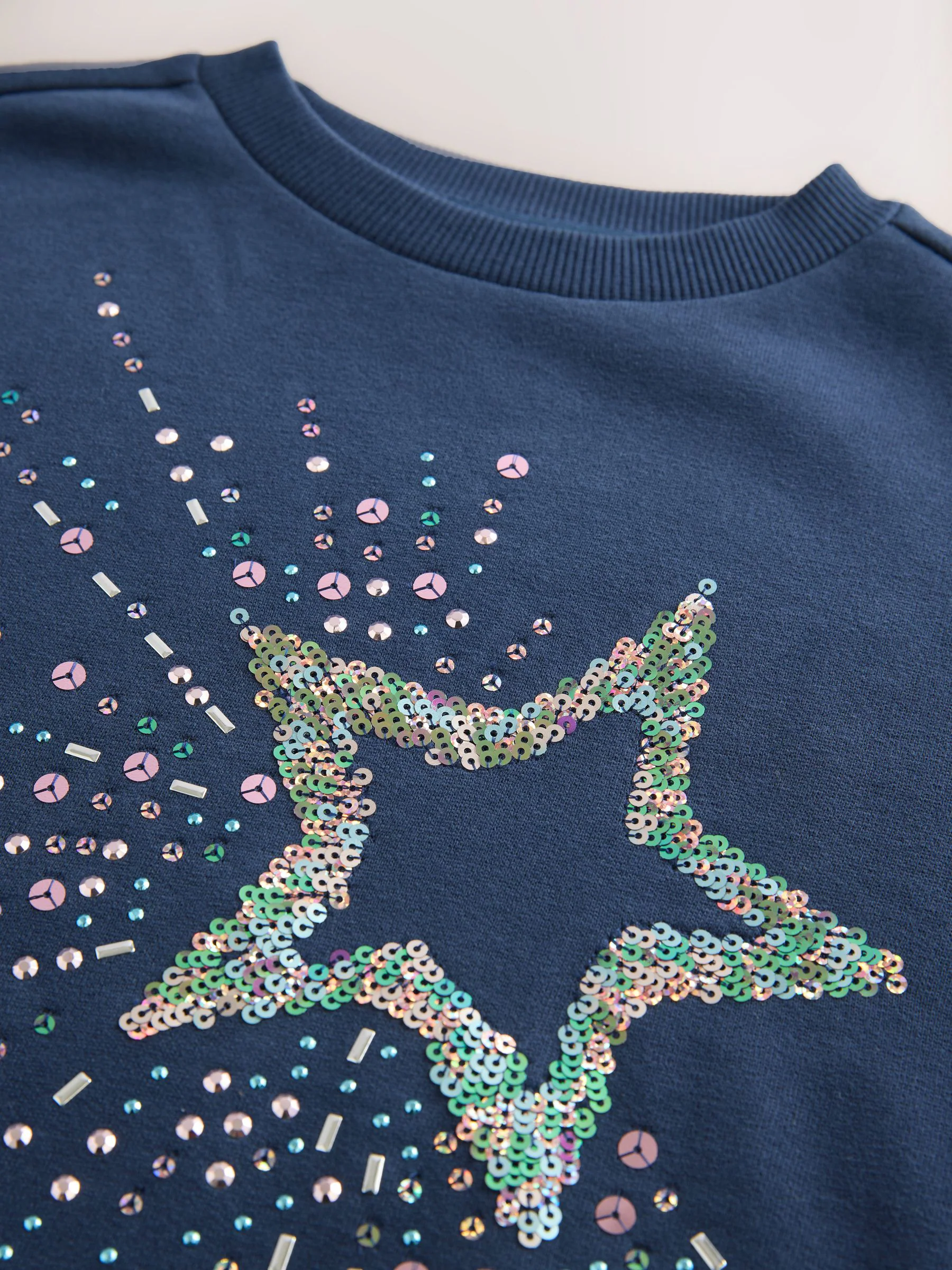 Marineblauw met lovertjes en sterrenprint - Trui-jurk (3-16 jr)