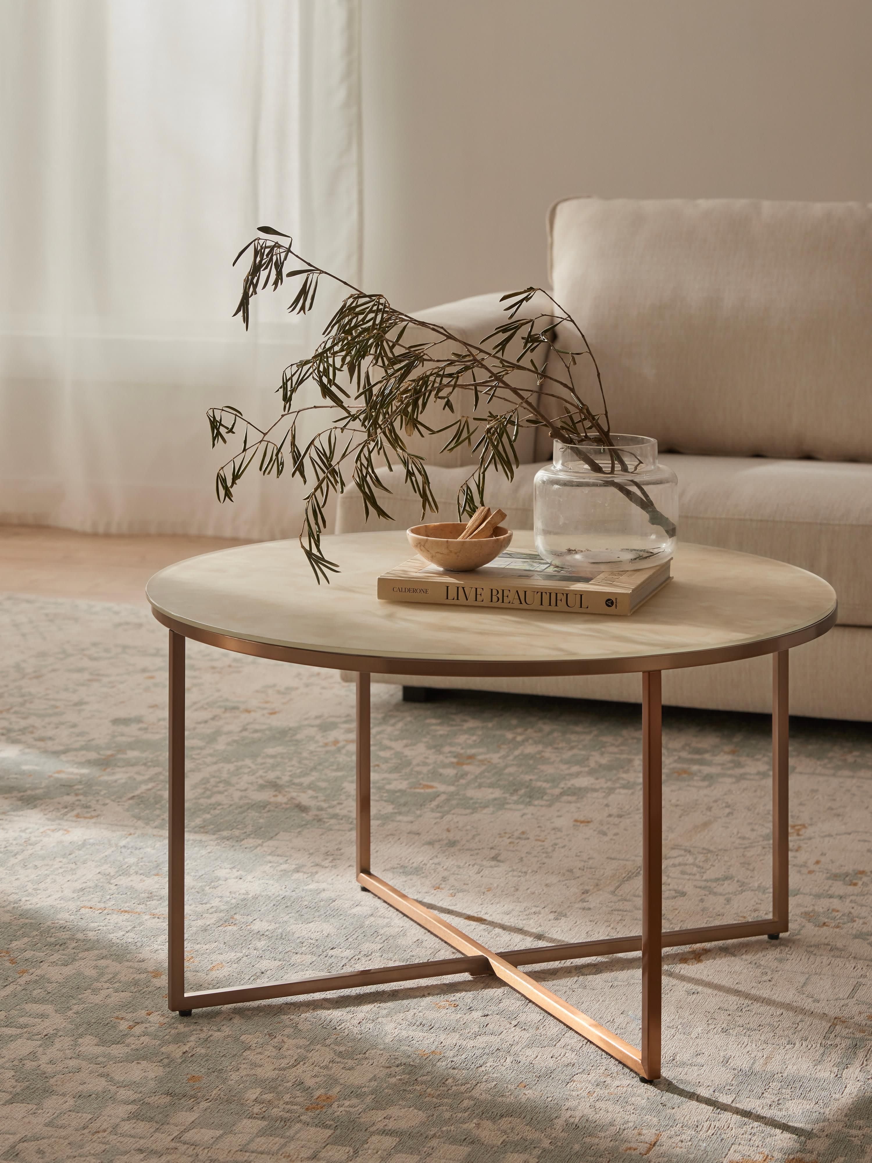 Ronde salontafel Antigua met glazen tafelblad in marmerlook