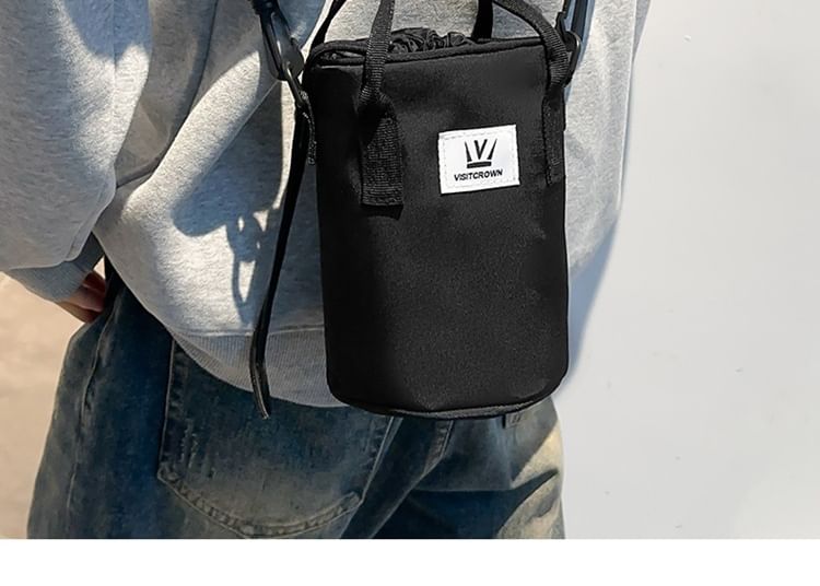 Hikuozy - Crossbodytas met trekkoord en letters
