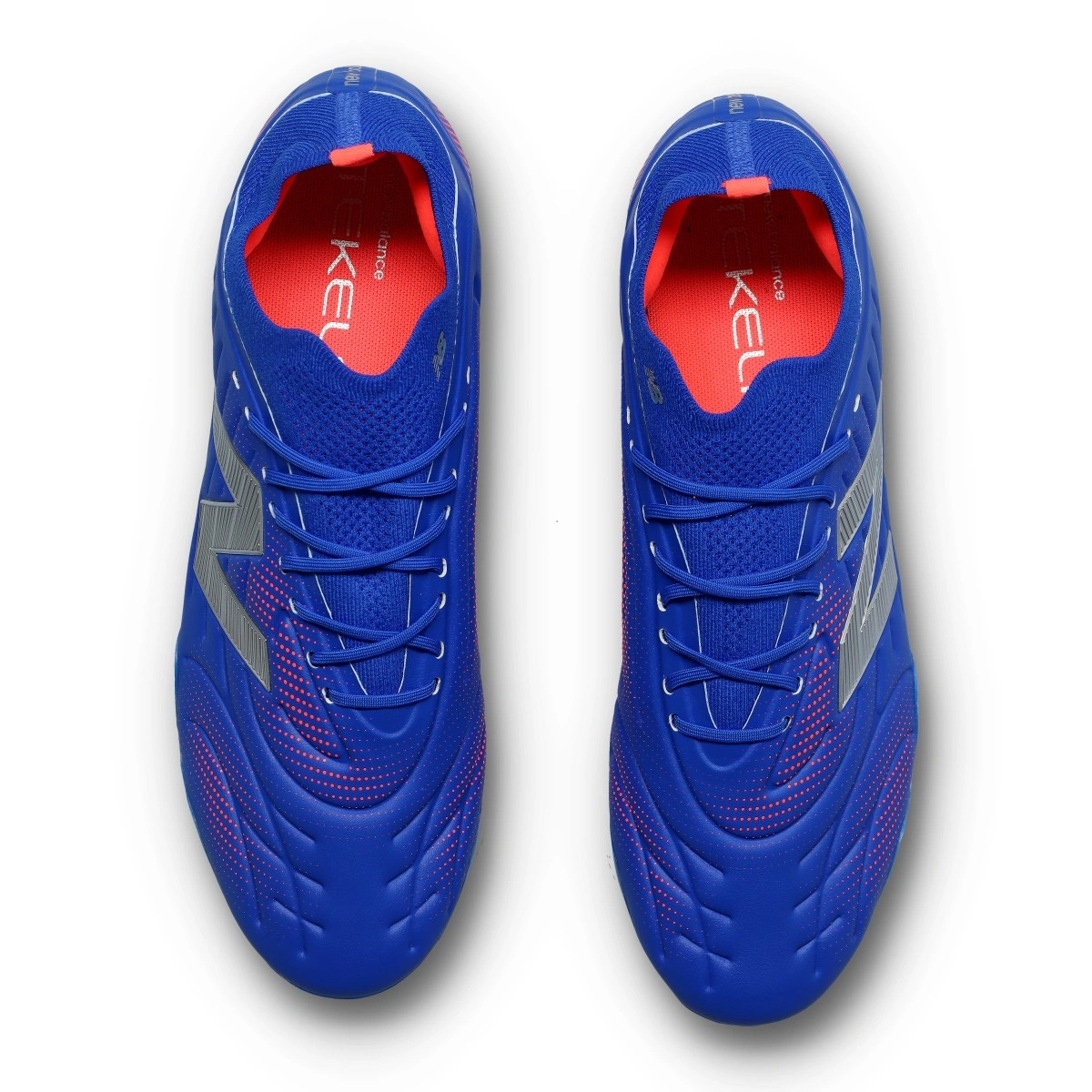 Chuteira New Balance Tekela Pro Low Laced FG V5