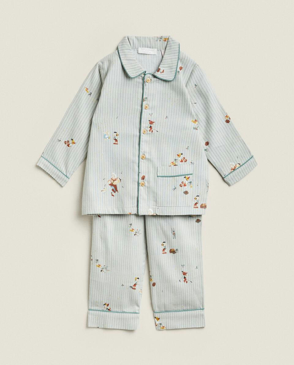Pijama infantil de flanela com estampa de Natal do Pinóquio da Disney.