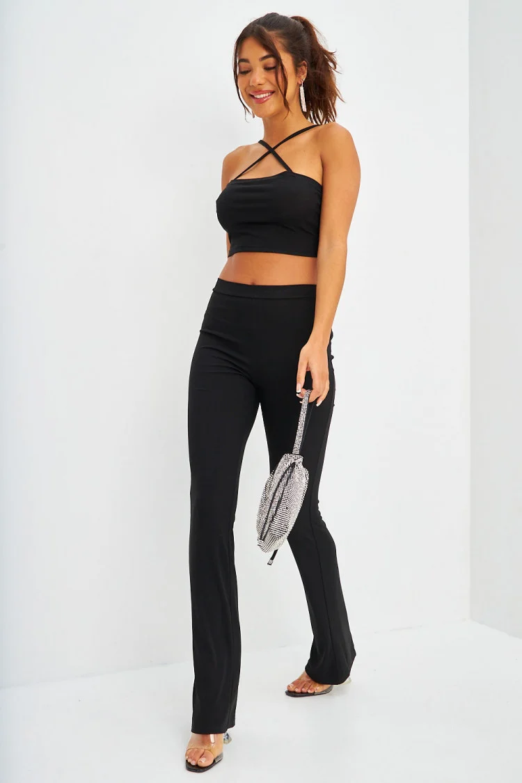 Ensemble crop top à bretelles + pantalon évasé côtelé noir