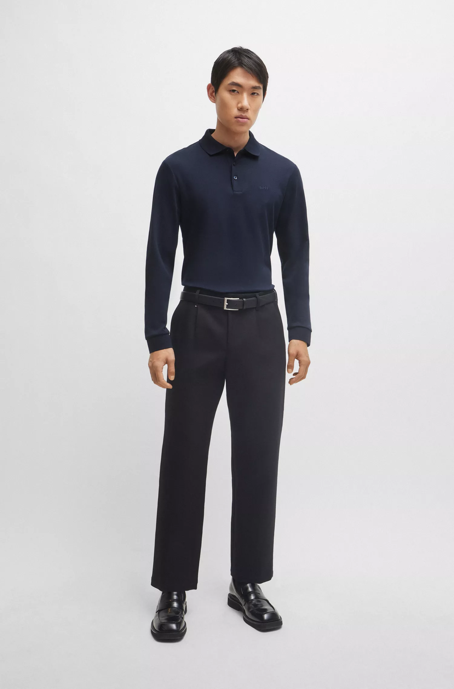 Camisa polo BOSS preta em algodão interlock com logotipo bordado.