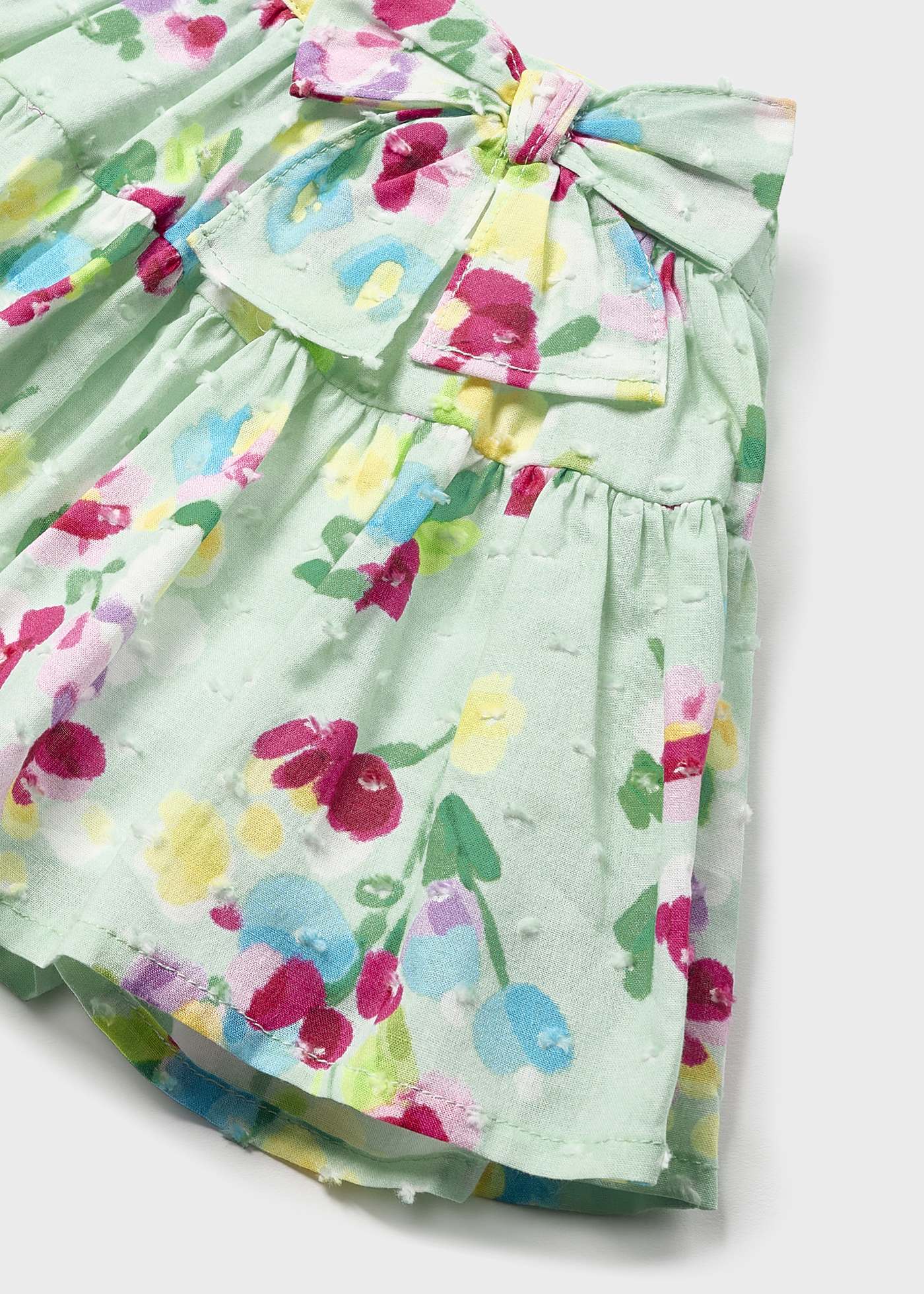 Conjunto de duas peças com saia de algodão estampada para bebê