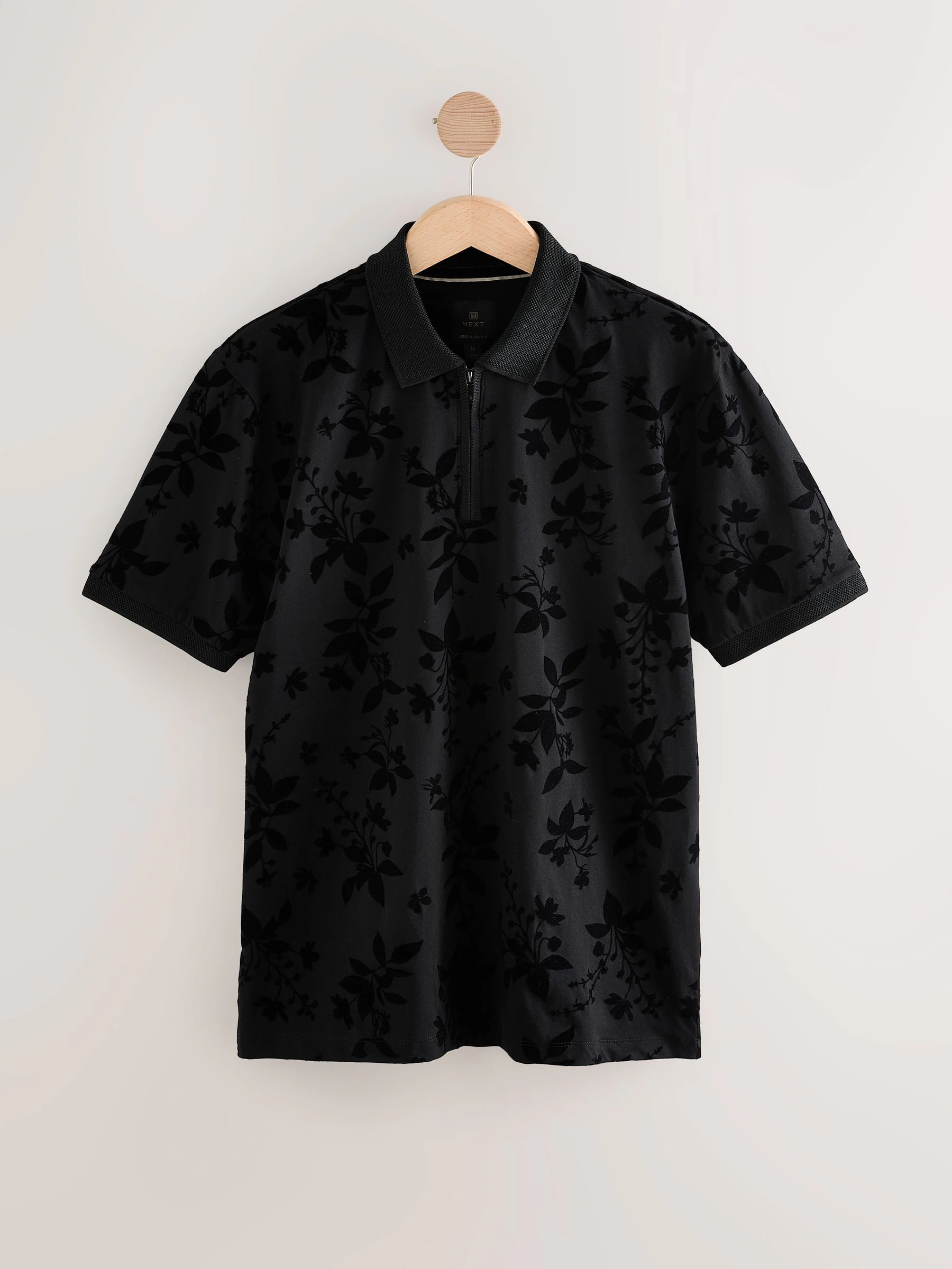Zwart bloemenprint - Kwart poloshirt met gevlokte ritssluiting