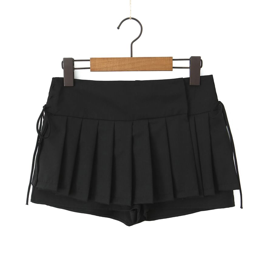 Asiris - Lage taille, vetersluiting, effen mini geplooide skorts