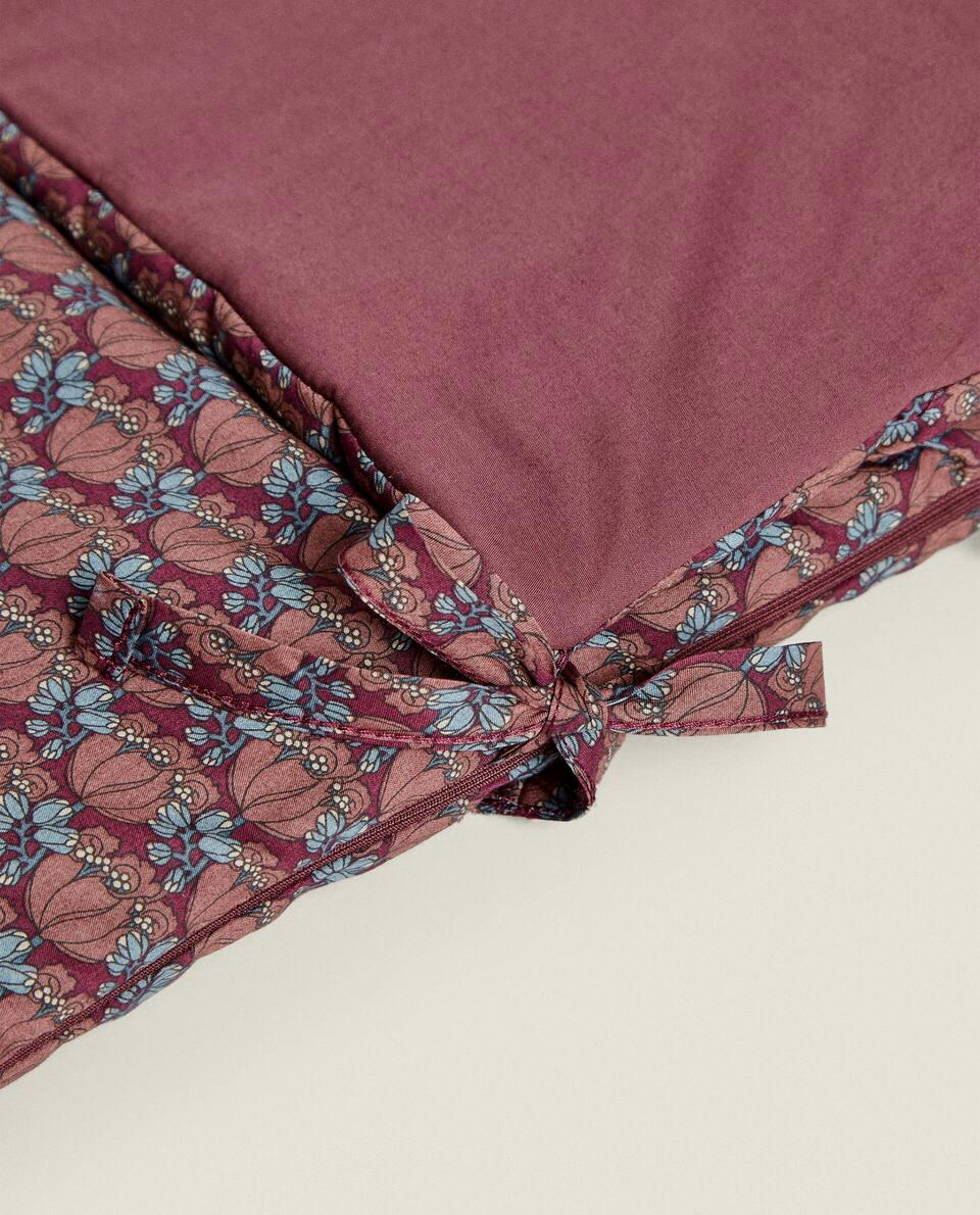 Saco de dormir infantil feito com tecido Liberty.