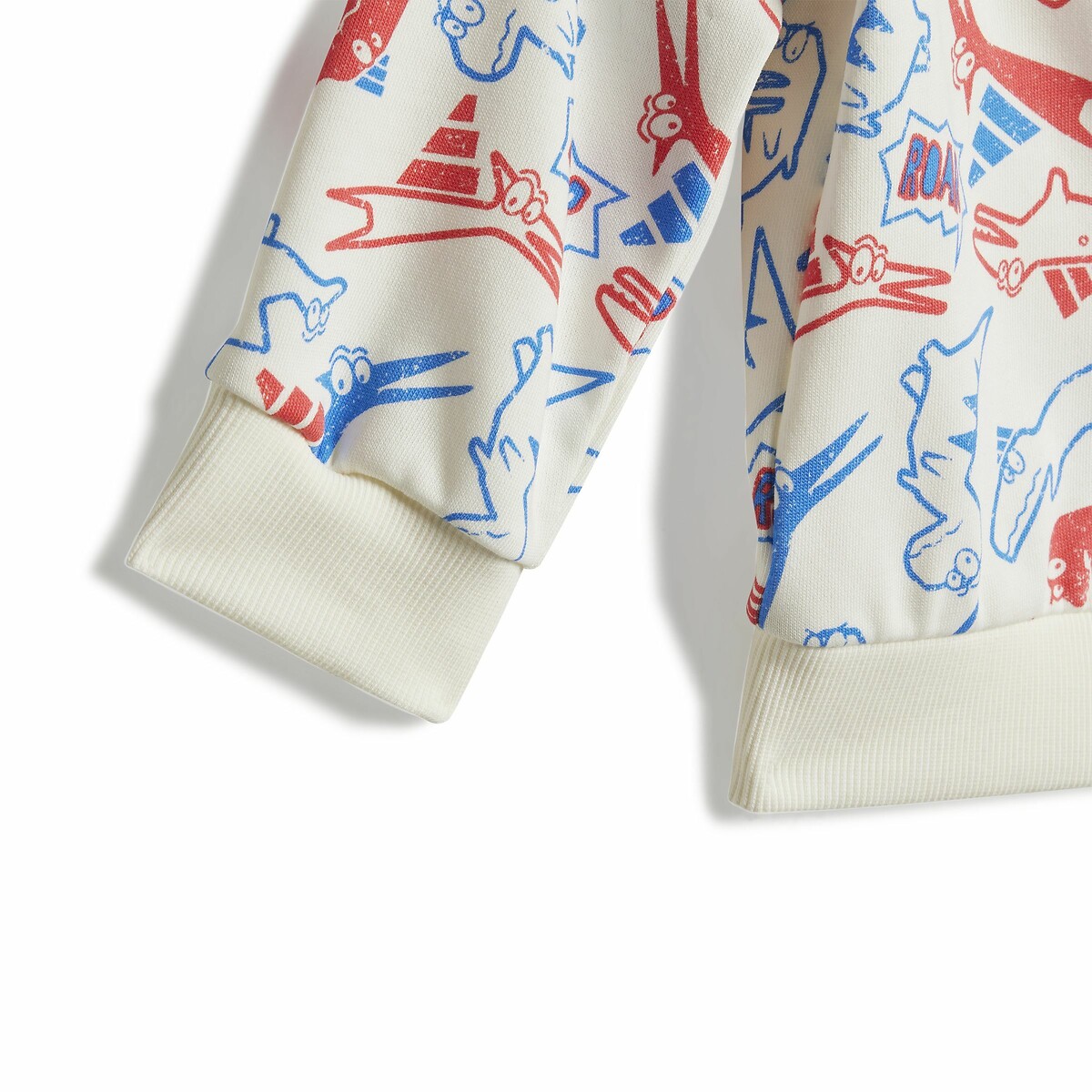 ADIDAS ROUPAS ESPORTIVAS<br>Conjunto infantil em fleece escovado com estampa de dinossauro