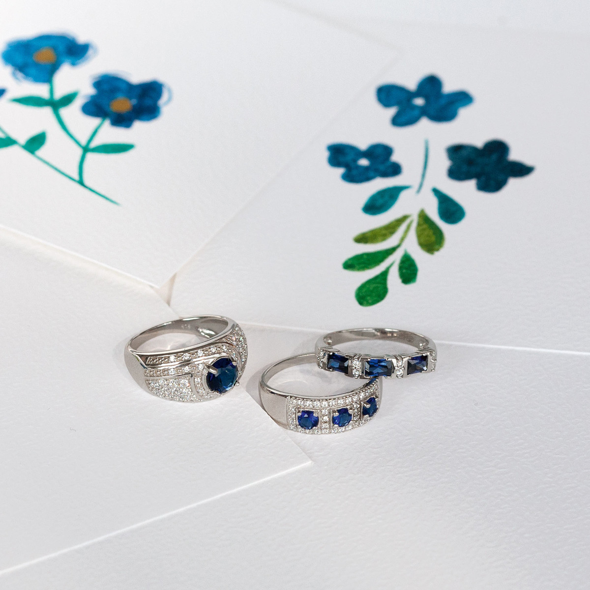 Bague argent 925 pierre imitation bleue et zirconias