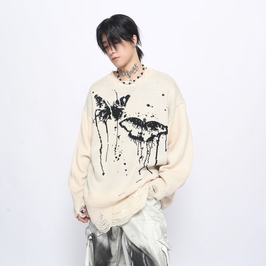 Derbundy - Oversized trui met ronde hals en vlinderprint