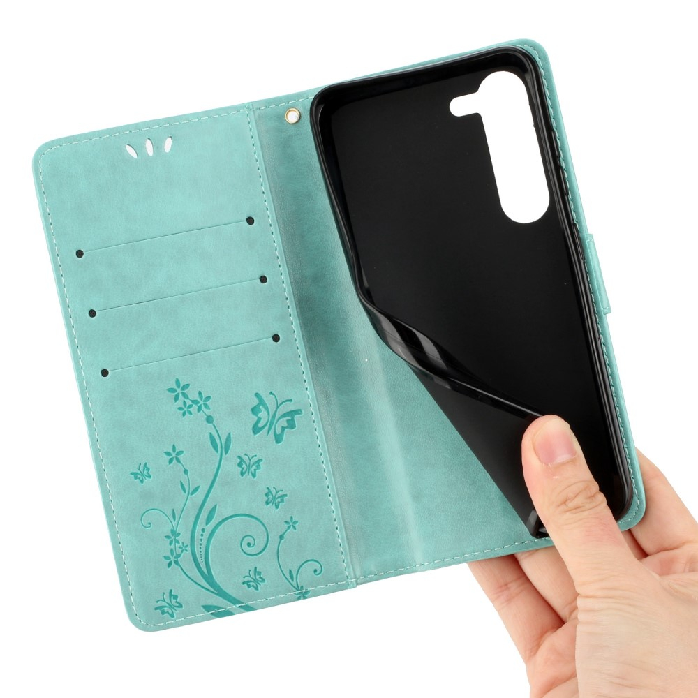 Samsung Galaxy S23 5G Leder Tasche mit Kartenfach   Handschlaufe Butterfly Flowers - Türkis