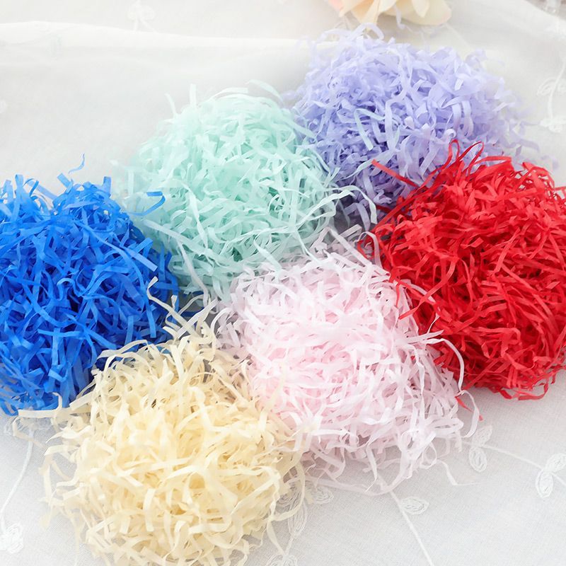 Bakebask - Decoraties van raffia versnipperd papier