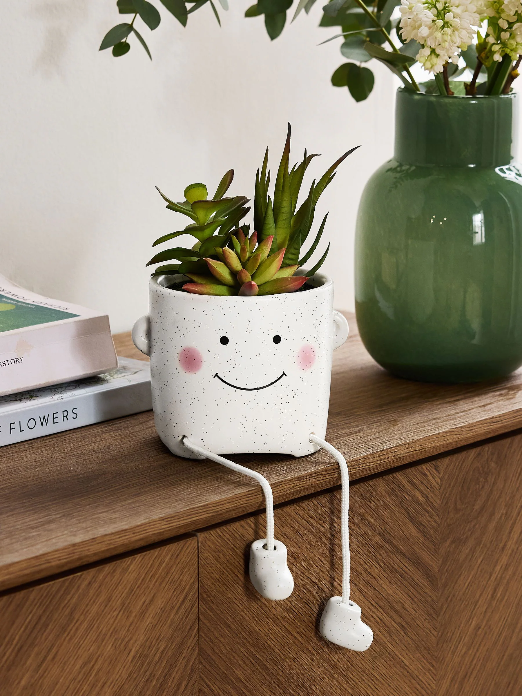 Artificial Succulents In Smiley Dangly Leg Ceramic Pot