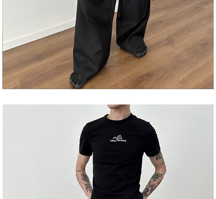 Nahagin - Effen pantalon met wijde pijpen en halfhoge taille