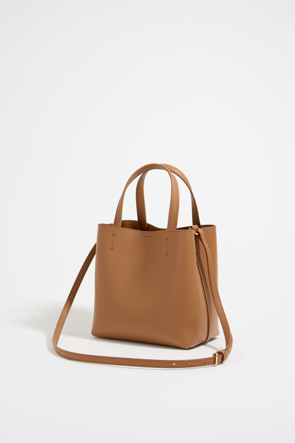 Pequena bolsa Chihuahua em couro cor mel.