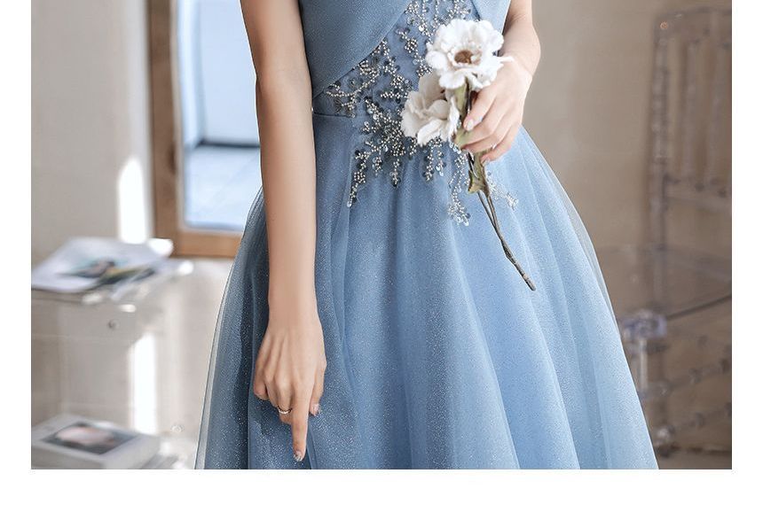 Saunderoll - Off-shoulder A-lijn avondjurk met pailletten / midi-jurk