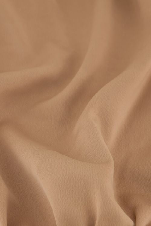 Beige satijnen top met knoop