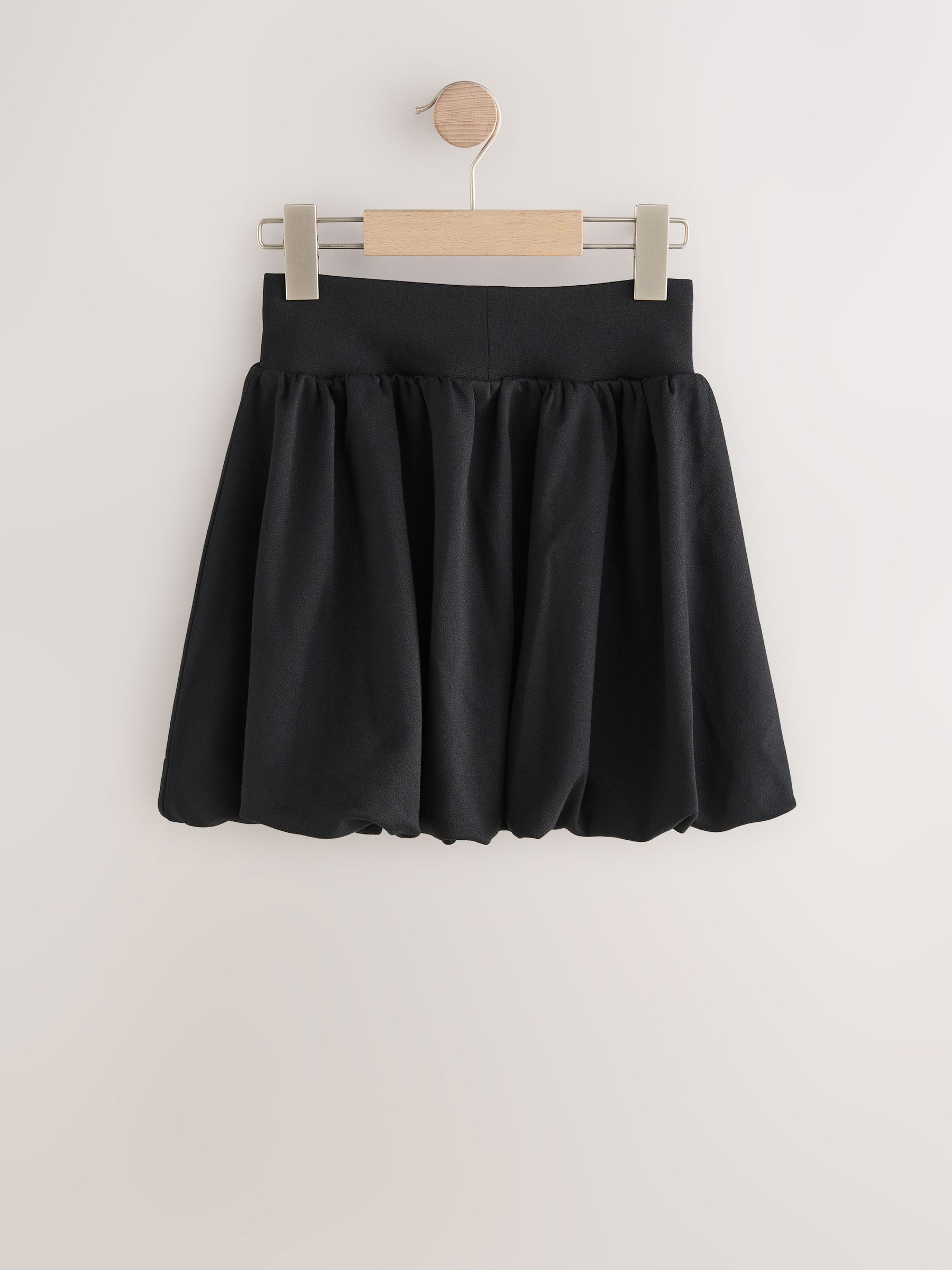 Zwart - Jersey stretch rok met ballonzoom en elastische taille (3-17jr)