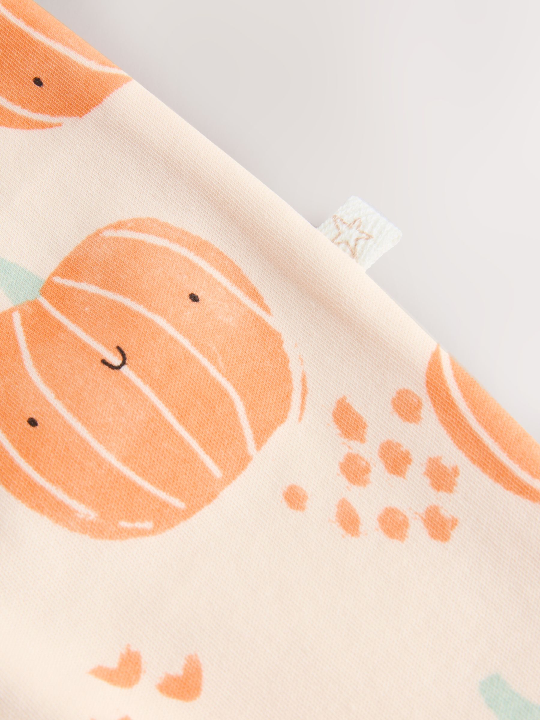 Oranje - Voetloze babypyjama met tweewegrits met pompoenen (0mnd-3jr)