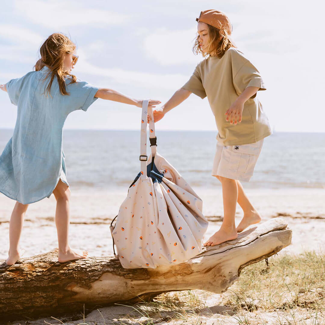 play&go waterdicht speelkleed en opbergzak noomad outdoor - magical da