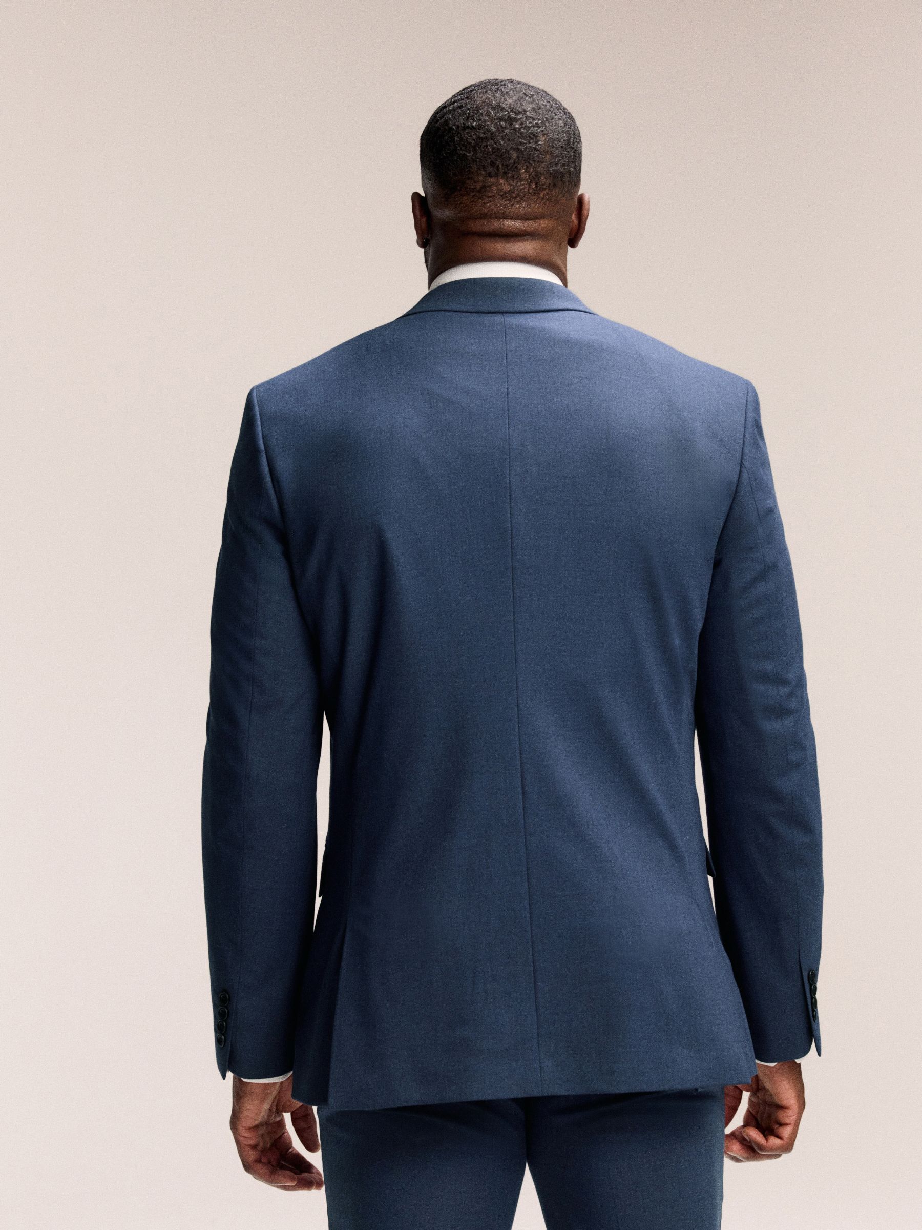 Blauw - Muscle fit meegevend stretchkostuumjasje