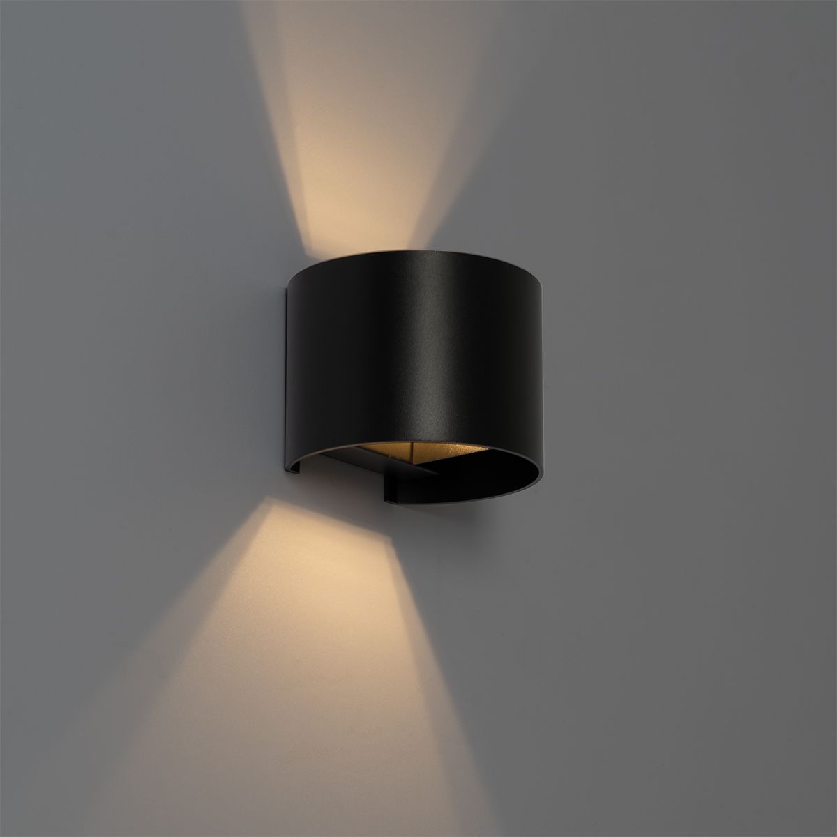 Moderne wandlamp zwart met lichteffect rond - Edwin