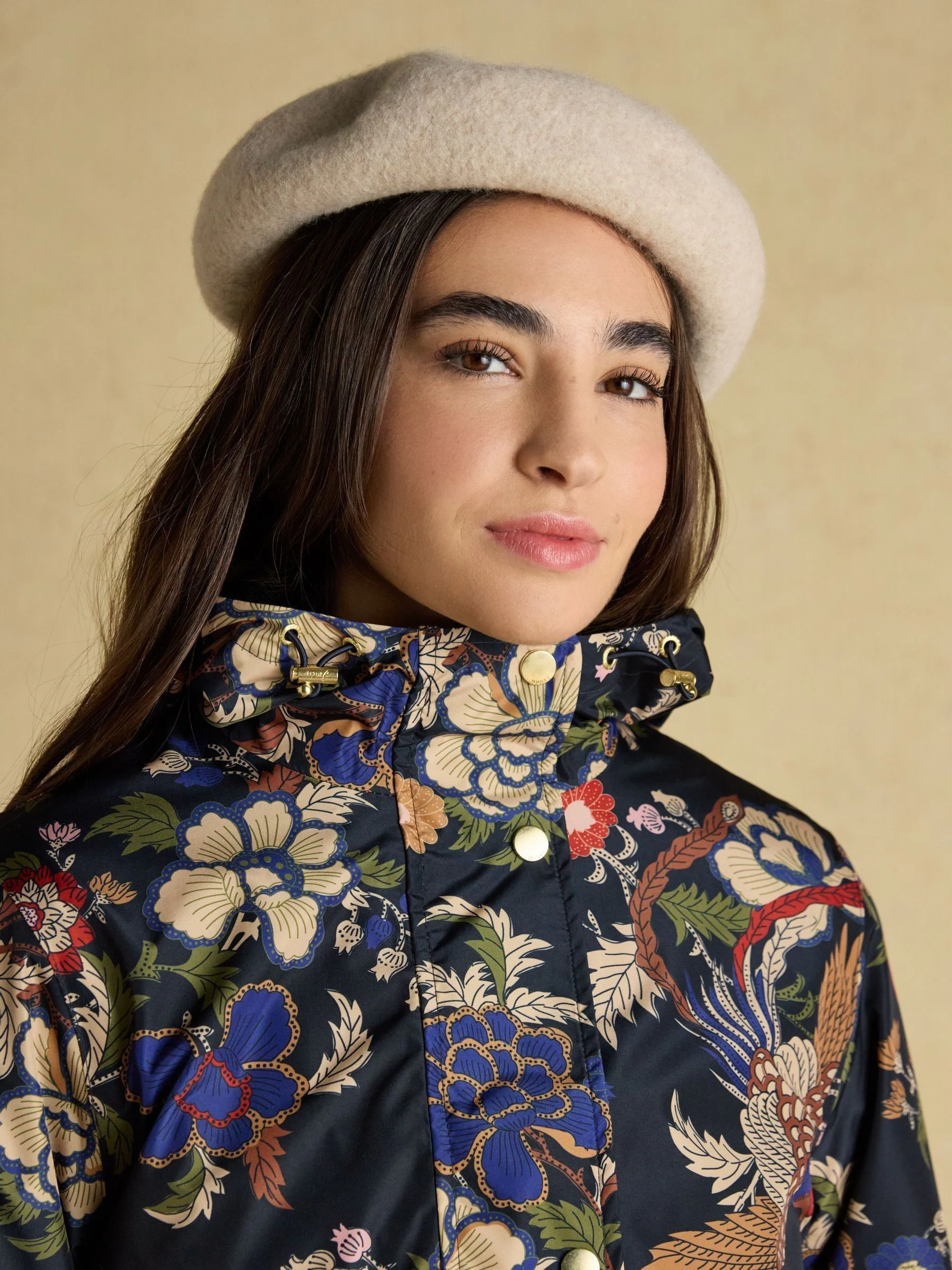 Marineblauw met vogel en bloemenprint - Joules Holkham waterdichte opvouwbare regenjas met capuchon