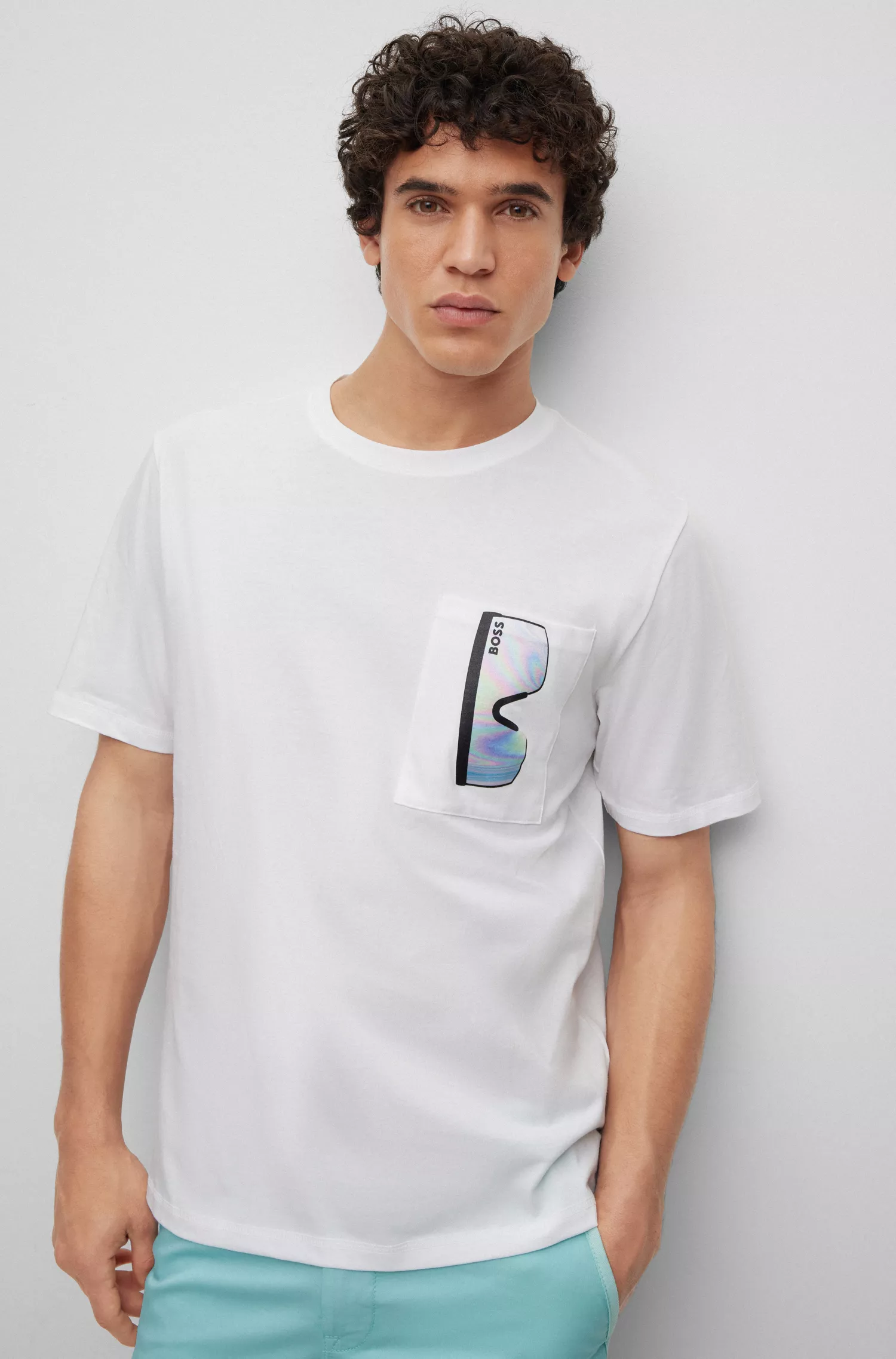 Camiseta BOSS laranja, modelagem relaxada, em algodão, com estampa na frente e nas costas.