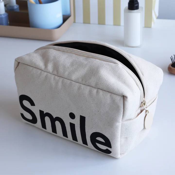 Design Letters - Travel Kulturbeutel mit Brosche, 21 x 10 x 12 cm, natur / schwarz