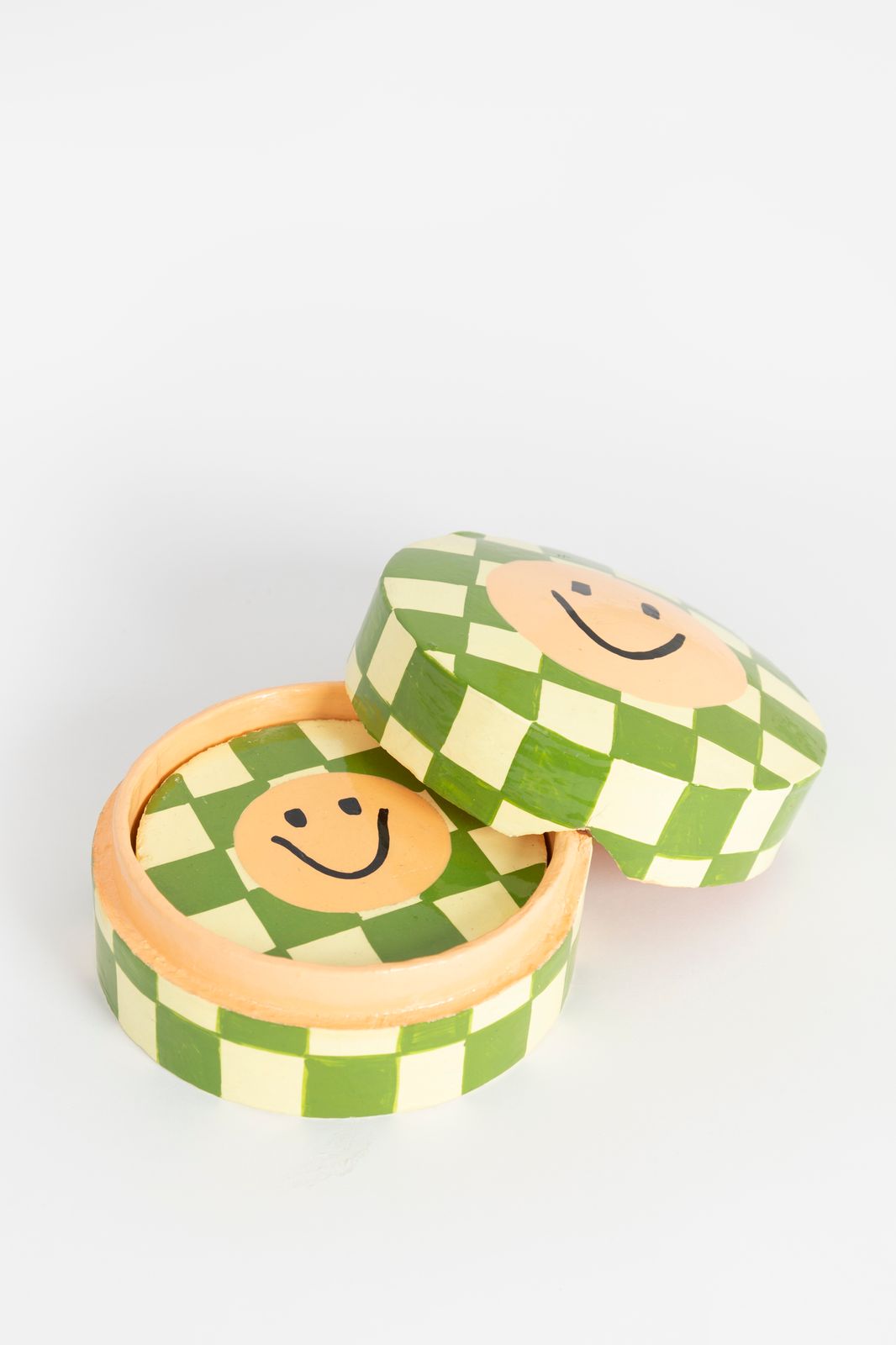 Groen geblokte glasonderzetters met smiley