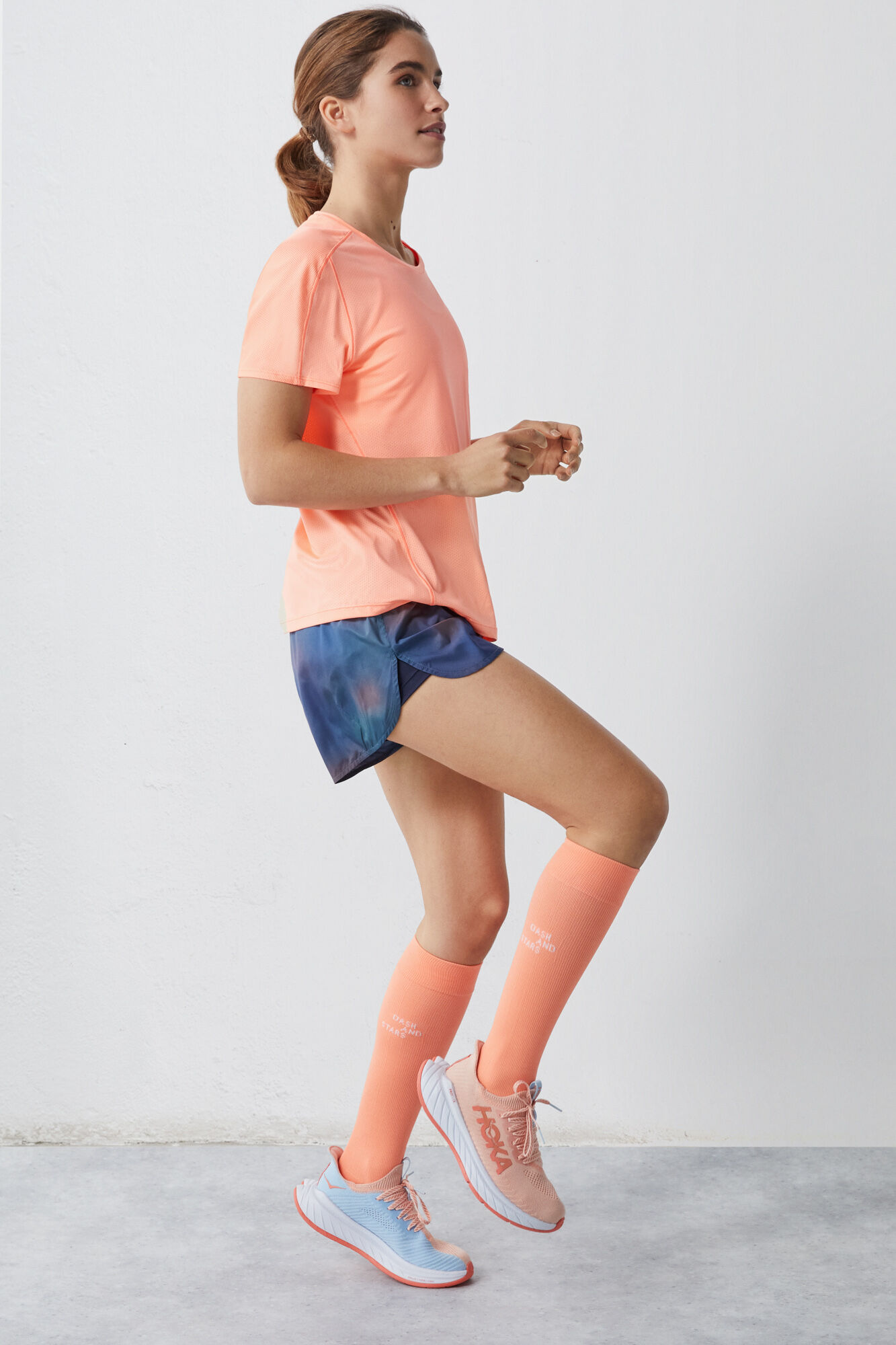 Camiseta técnica respirável laranja-avermelhada