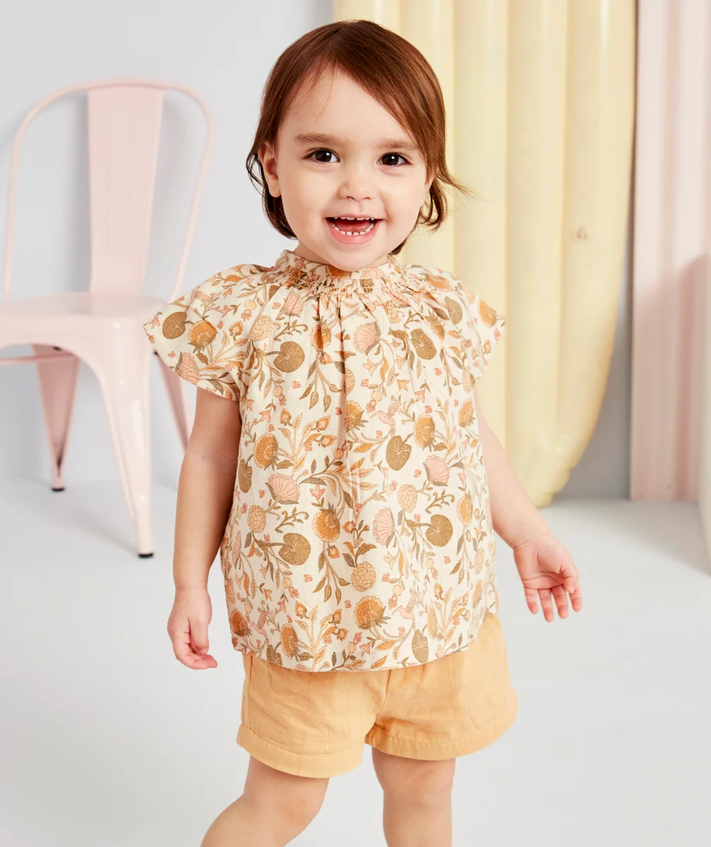 BLOUSE BÉBÉ FILLE EN COTON AVEC COL BARDOT ET IMPRIMÉ