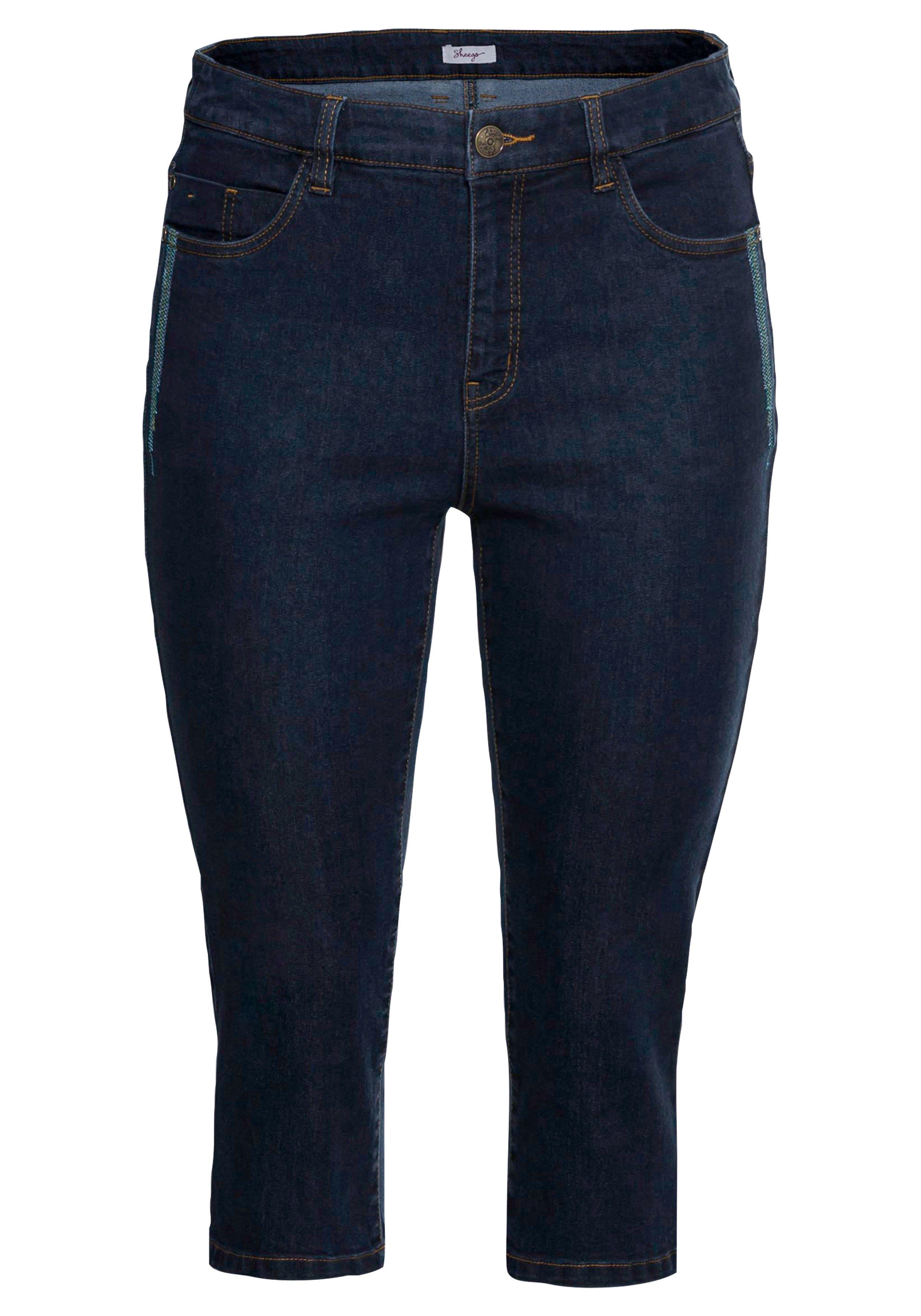 Caprijeans mit Catfaces und Kontrastnähten