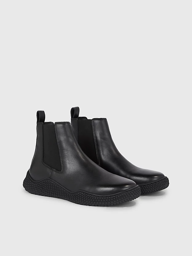botas de couro até o tornozelo